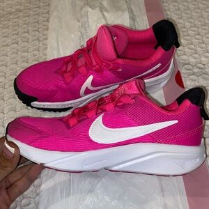pink nikes (kids slightly used)